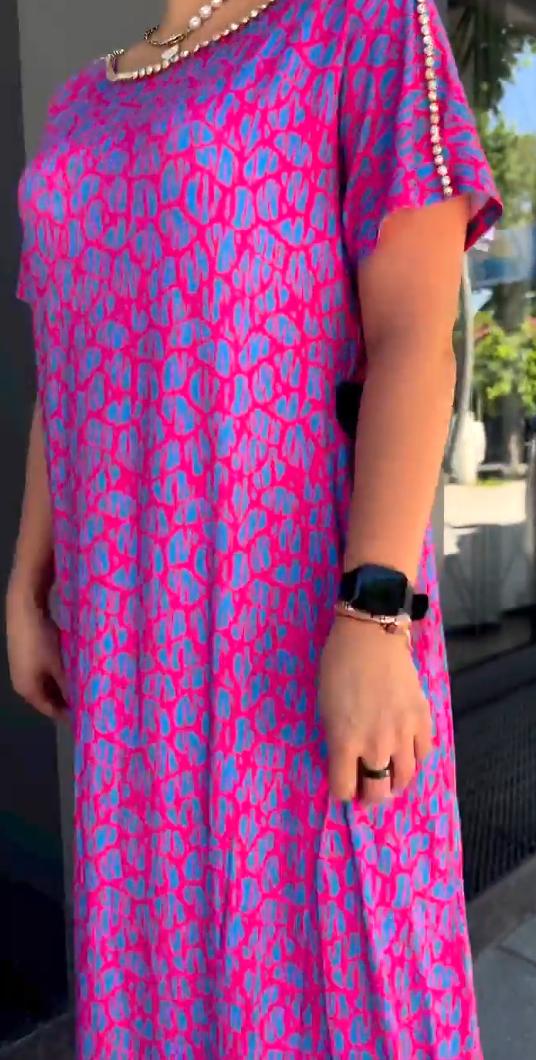 👗【M-3XL】Abito taglie forti con stampa alla moda 2024