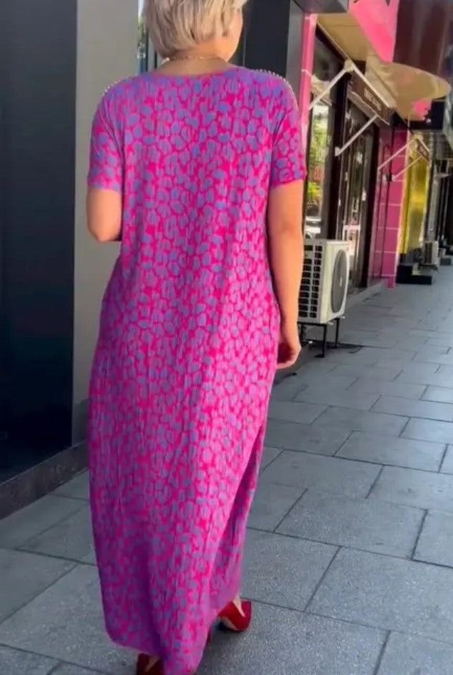 👗【M-3XL】Abito taglie forti con stampa alla moda 2024