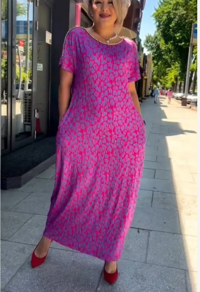 👗【M-3XL】Abito taglie forti con stampa alla moda 2024
