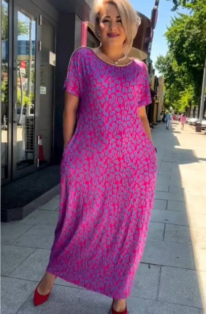 👗【M-3XL】Abito taglie forti con stampa alla moda 2024