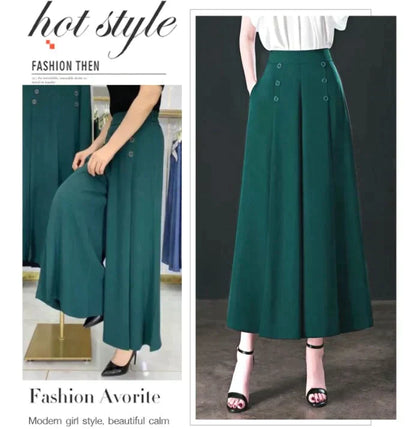 Pantaloni alla moda e pieghettati con una gamba larga