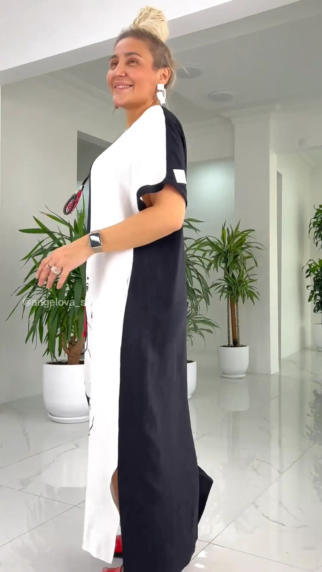 🌼49% Rabatt👗Schönes, lockeres Maxikleid mit abstraktem Gesichtsdruck in Schwarz und Weiß