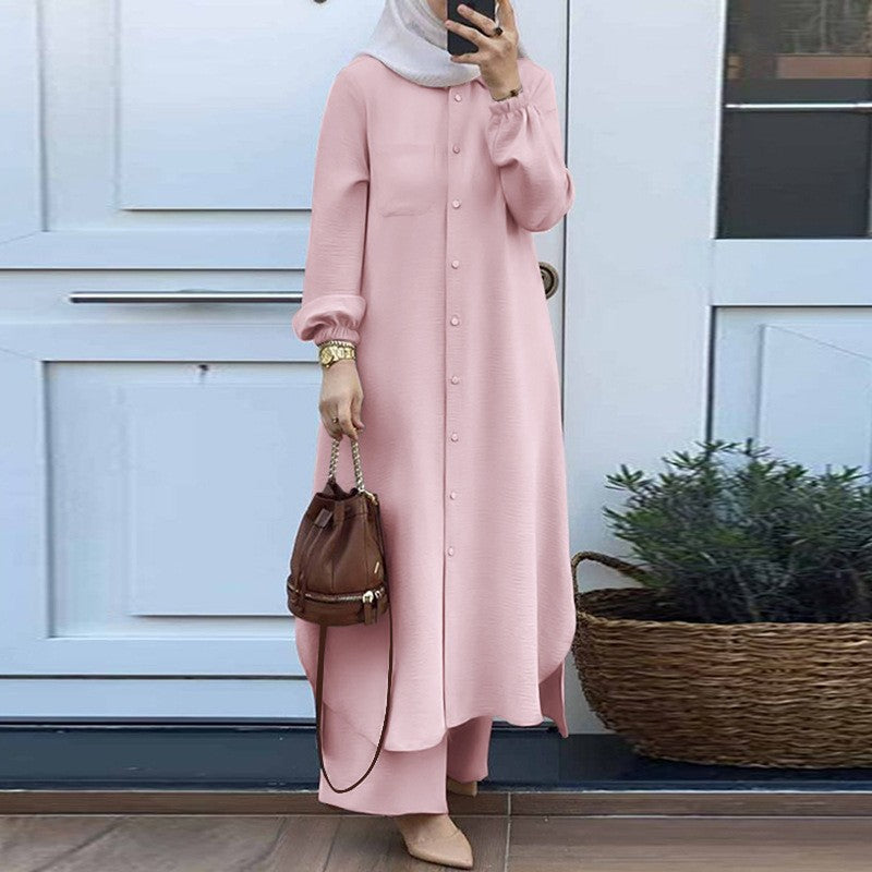 Two -part women's suit made of long shirt and pants with long sleeves and lapels