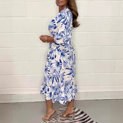 👗49 % rabatt🌺Eleganta V-ringade klänningar med botaniska motiv för kvinnor