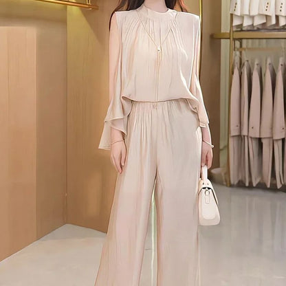 Set elegante e fluente a due parti per donne, top senza maniche e pantaloni con una gamba larga