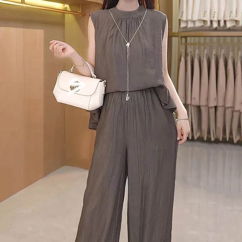 Set elegante e fluente a due parti per donne, top senza maniche e pantaloni con una gamba larga
