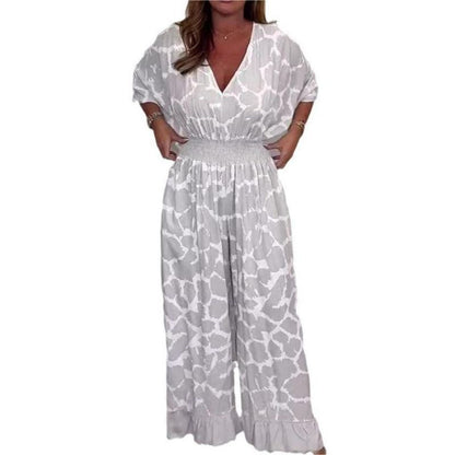 💥Tijdelijke korting van 50% 💕Ademende jumpsuit met diepe V-hals en taille voor dames