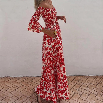 Robe longue avec motif floral, épaules ouvertes et manches exposées