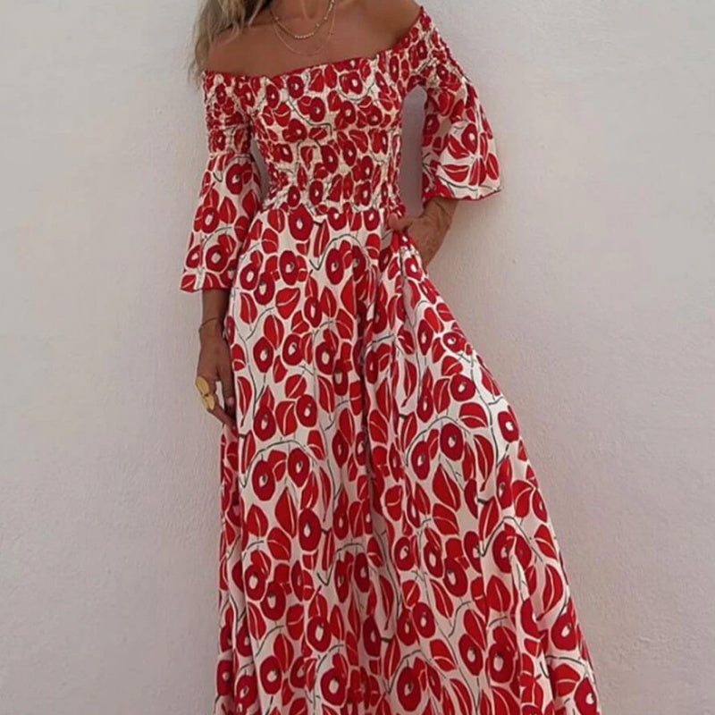 Robe longue avec motif floral, épaules ouvertes et manches exposées