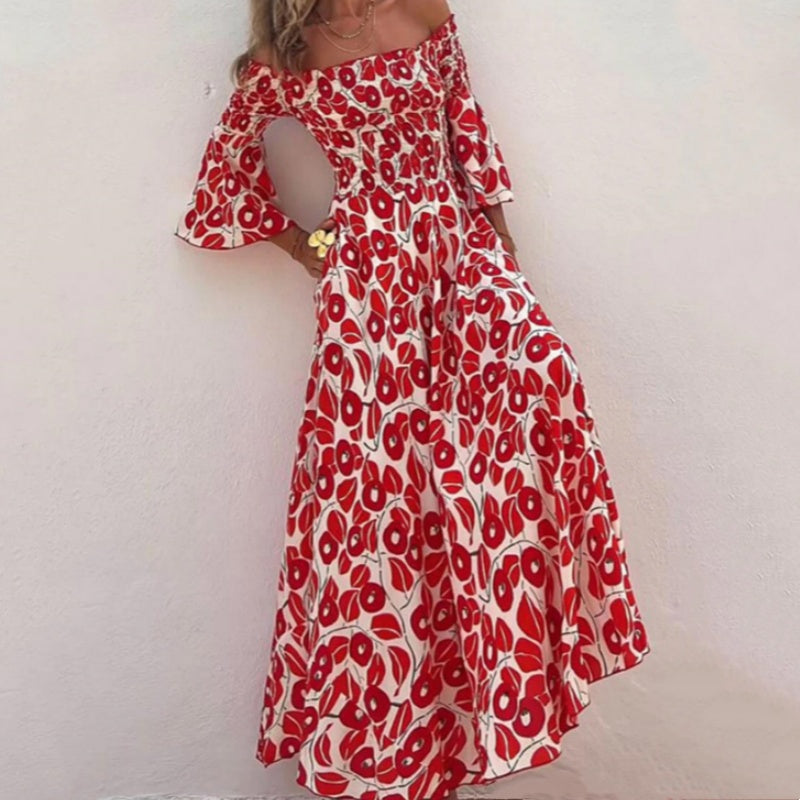 Robe longue avec motif floral, épaules ouvertes et manches exposées