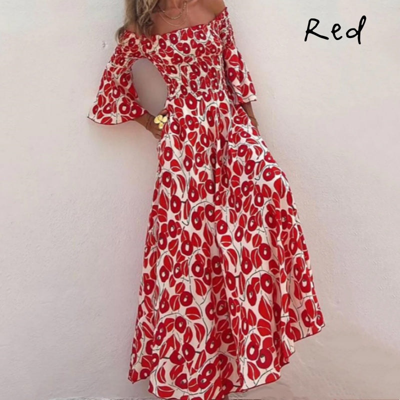 Robe longue avec motif floral, épaules ouvertes et manches exposées