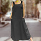 Maxikleid with wide carriers and bags