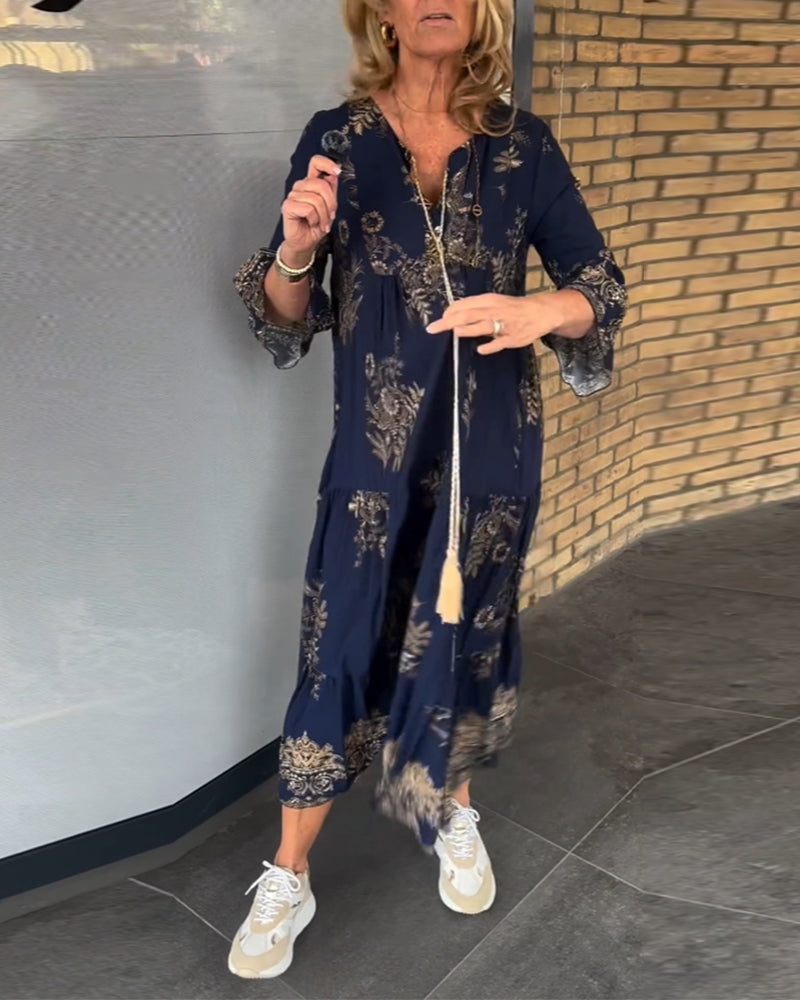 Bredskåret vintage kjole med en v-leckline