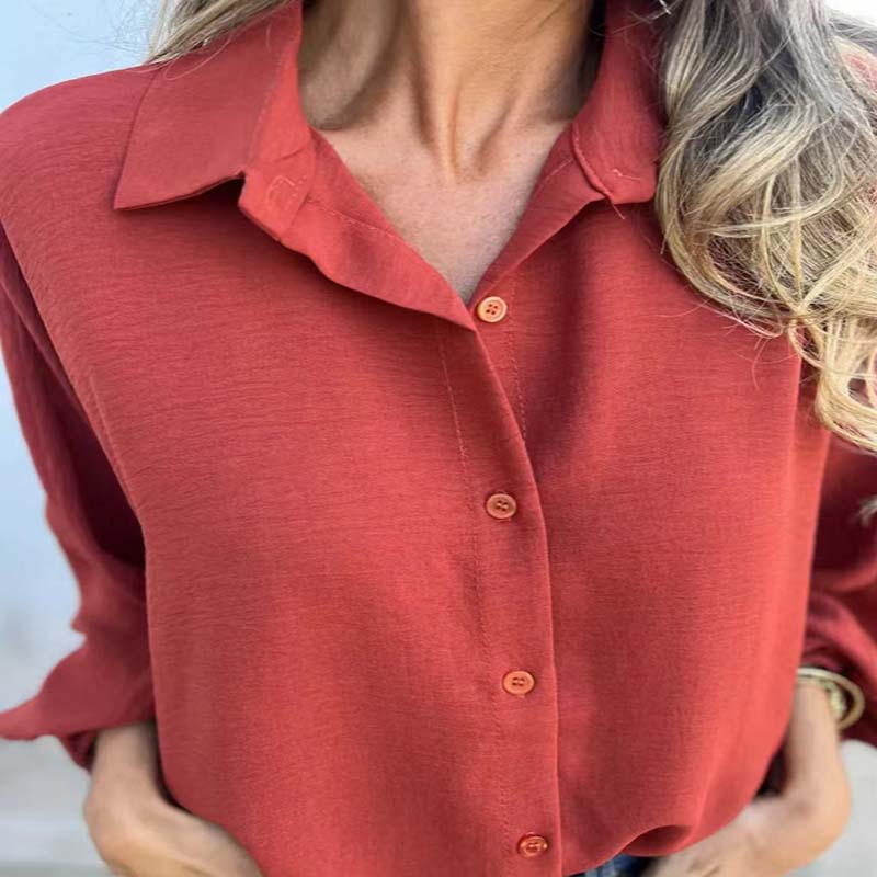 Elegant single -colored dameshemd met knoopsplacket