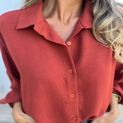 Elegant single -colored dameshemd met knoopsplacket