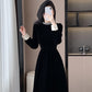 Elegant women's dress with a circular neckline and long sleeves