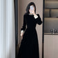 Elegant women's dress with a circular neckline and long sleeves