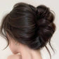 Wig's hair clip in messed up hairstyle