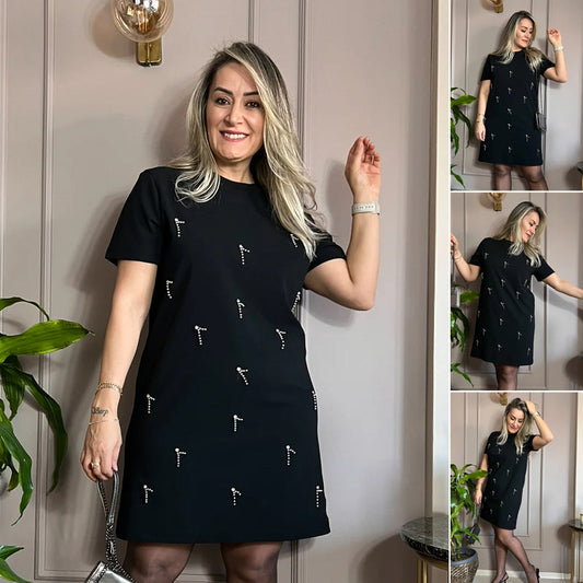 Abito da donna con strass e braccia corte