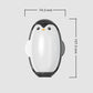Rollador de pelusa lavable en forma de un pequeño pingüino