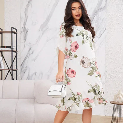 Flowing chiffon dress with blush-colored petals