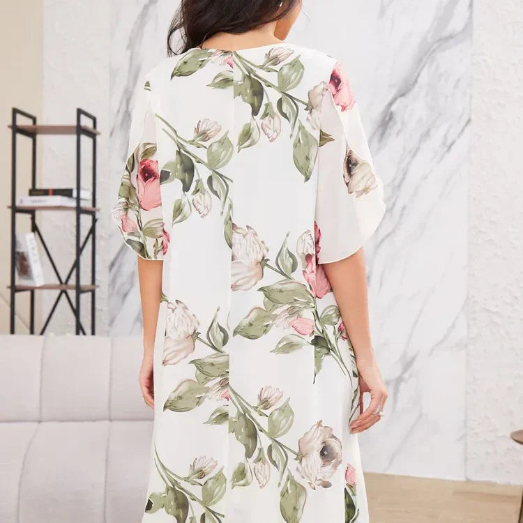 Flowing chiffon dress with blush-colored petals