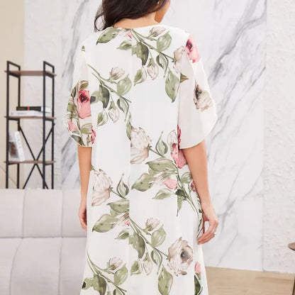 Flowing chiffon dress with blush-colored petals