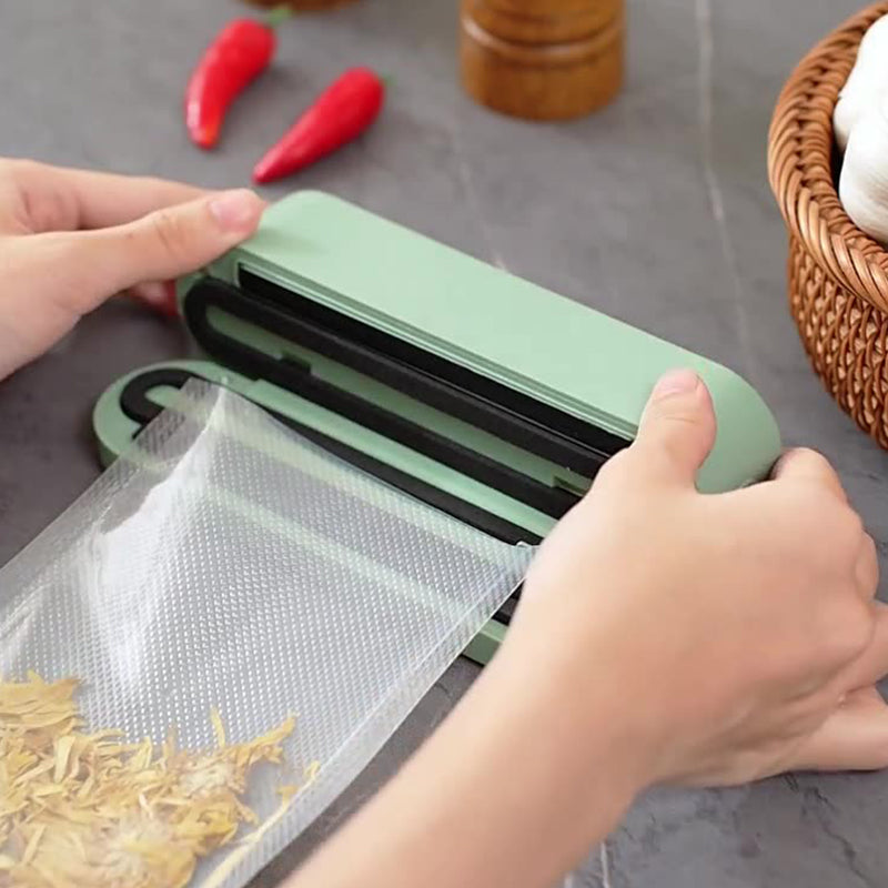 Imballaggio del vuoto a mano portatile e dispositivo di laminazione per la conservazione degli alimenti
