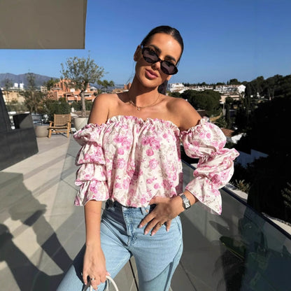 Off-shoulder-bluse med blomstertrykk og elastisk elastisk bånd på halsen