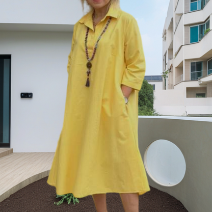 Robe de femme décontractée et monochrome avec des poches pratiques
