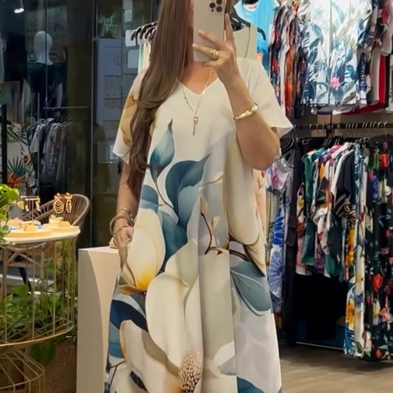 Ladies Loose leisure dress with V-neck, pressure and short sleeves