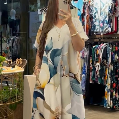 Ladies Loose leisure dress with V-neck, pressure and short sleeves