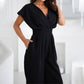 Jumpsuit mit V-Ausschnitt und weiten Beinen für Frauen