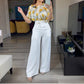 Set aus Oberteil mit Rundhalsausschnitt und weiter Hose