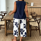 🌸 NUR FÜR KURZE ZEIT: 55 % RABATT! ✨ Set aus asymmetrischem Damenoberteil und Caprihose mit Blumenmuster – vielseitig, farbenfroh, bequem 🌺