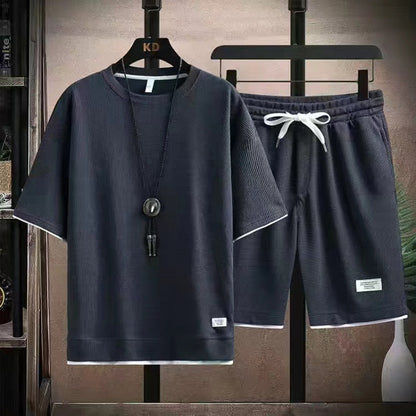 🔥Solange der Vorrat reicht 40 % Rabatt!🎉Herren 2-teiliges Set aus Waffelstoff: Kurzarm-T-Shirt & Shorts